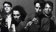 Tony Maimone (far right) with TMBG.  Photo courtesy Elektra